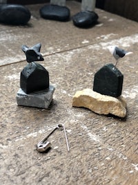 miniature seagulls on a rock