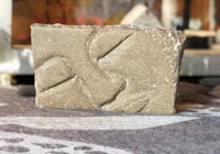 a piece of soap sitting on top of a table