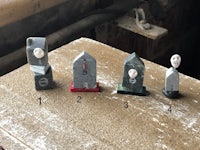 a group of small figurines sitting on a table
